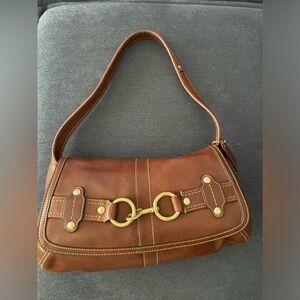 Coach Brown with brass hardware shoulder bag.